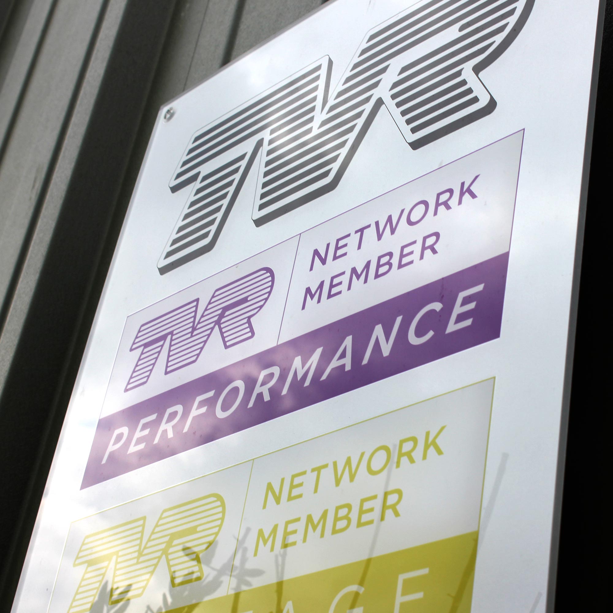 tvr network member signage outside topcats racing workshop
