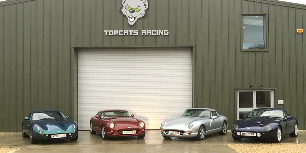 selection of four tvrs parked outside topcats racing workshop
