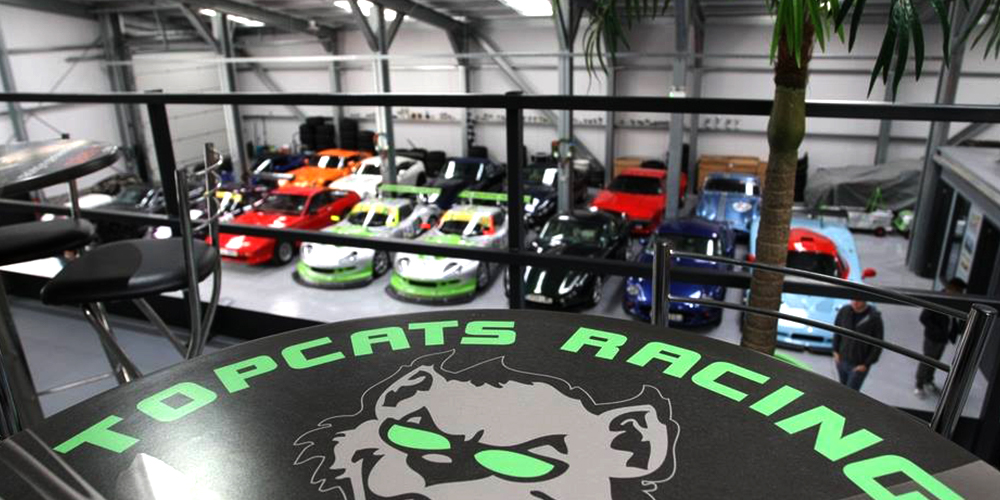 overhead view of topcats racing workshop from balcony waiting area and cafe