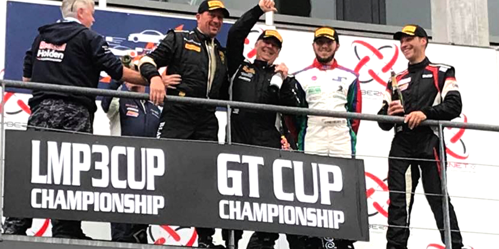 topcats racing team celebrating on podium at GT Cup championship