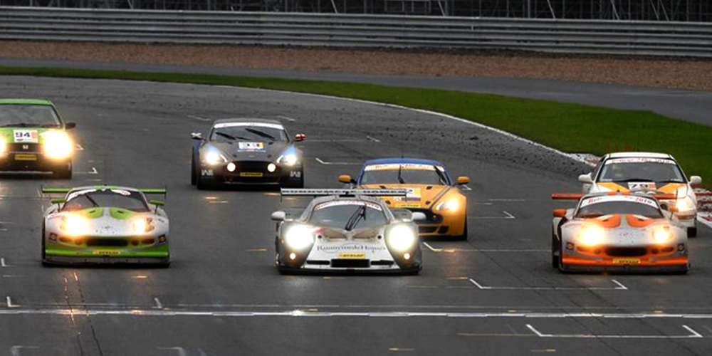 topcats racing marcos mantis' and mosler mt900 crossing finish line together at event