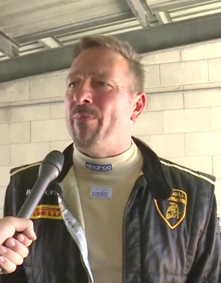 warren gilbert owner of topcats racing being interviewed